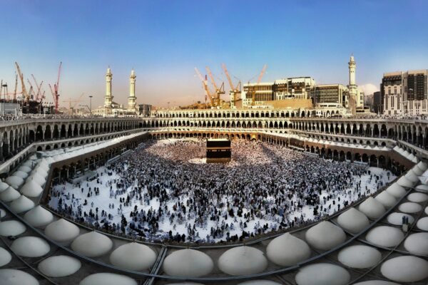 A peaceful view of the Kaaba and Prophet's Mosque, symbolizing the pilgrimages journey.